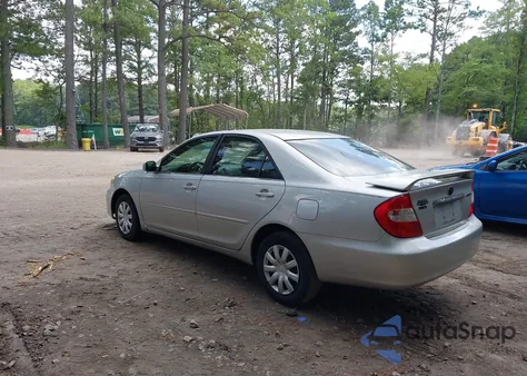 2003 Toyota Camry Le z USA, uszkodzony, nr VIN 4T1BE32K03U197691